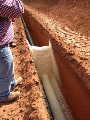 Installing spray foam trench breakers in Toronto area ON